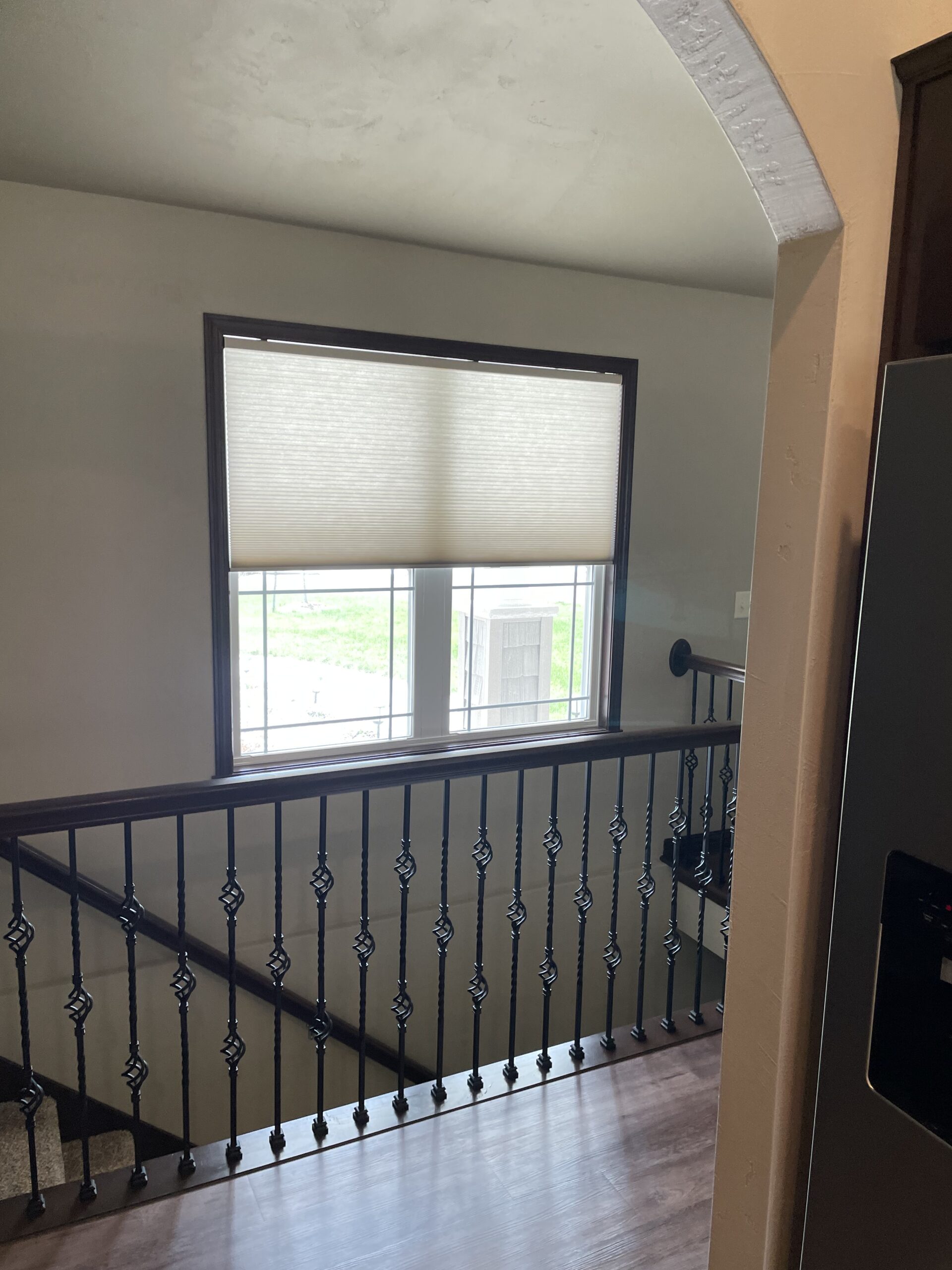 Residential installation showing a finished custom window treatment solution