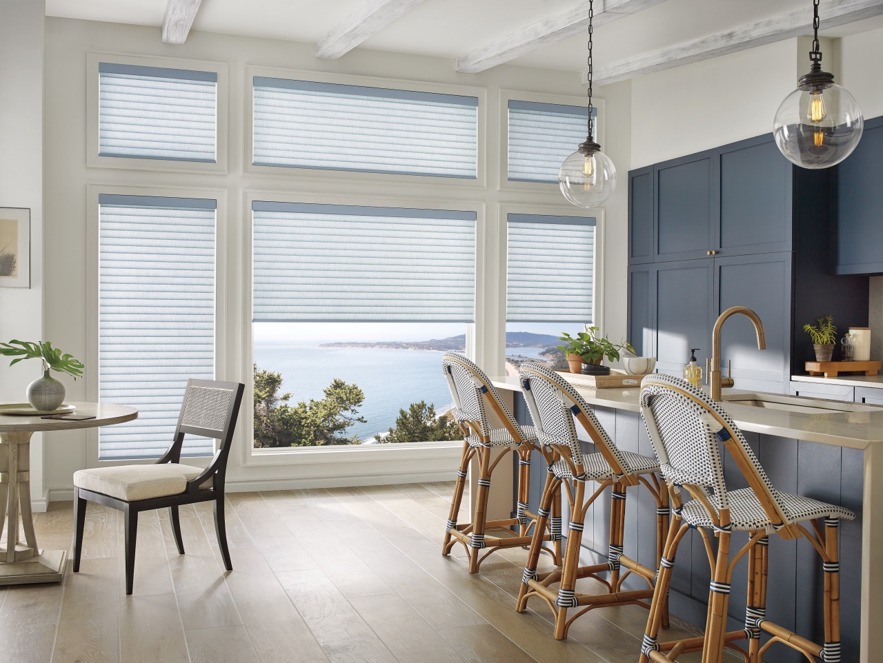 Sonnette® Cellular Roller Shades in a bright room with a streamlined roller profile and softly diffused daylight