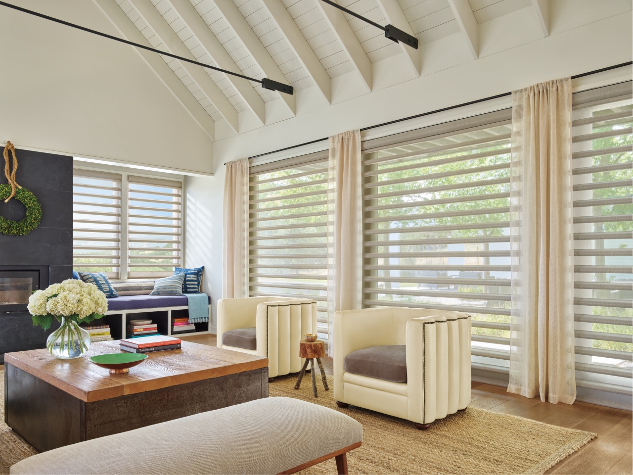 Pirouette® Window Shadings across a vaulted living room with sheer fabric vanes and softly filtered daylight