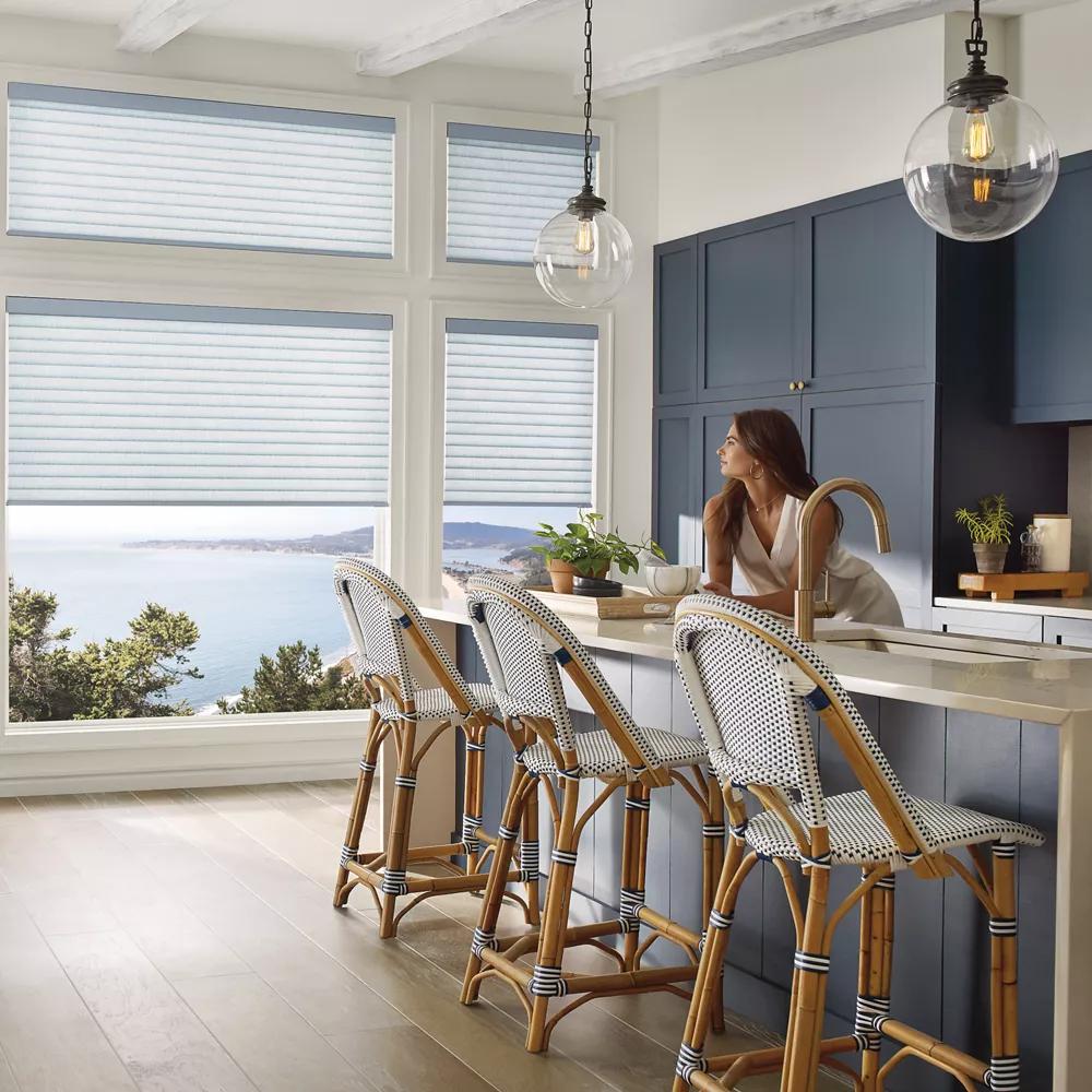 Shades fitted to tall kitchen windows and high transom windows