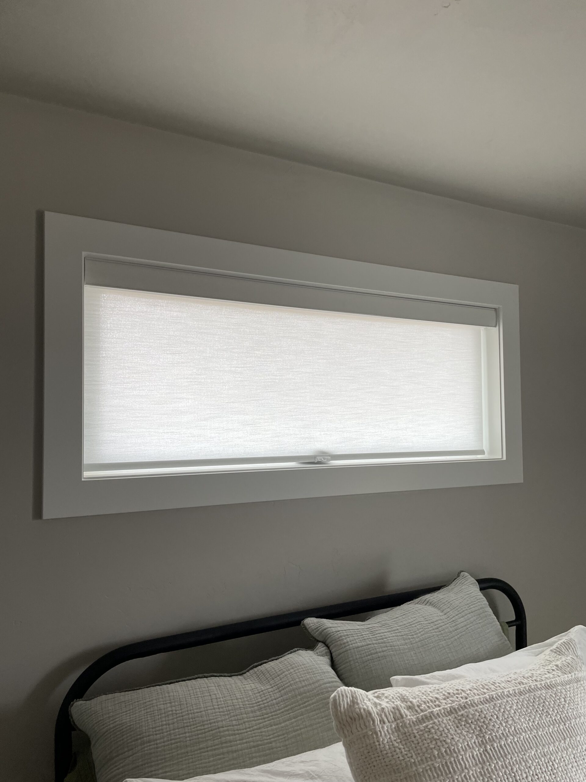 Completed window treatment project showing tailored fit at the window