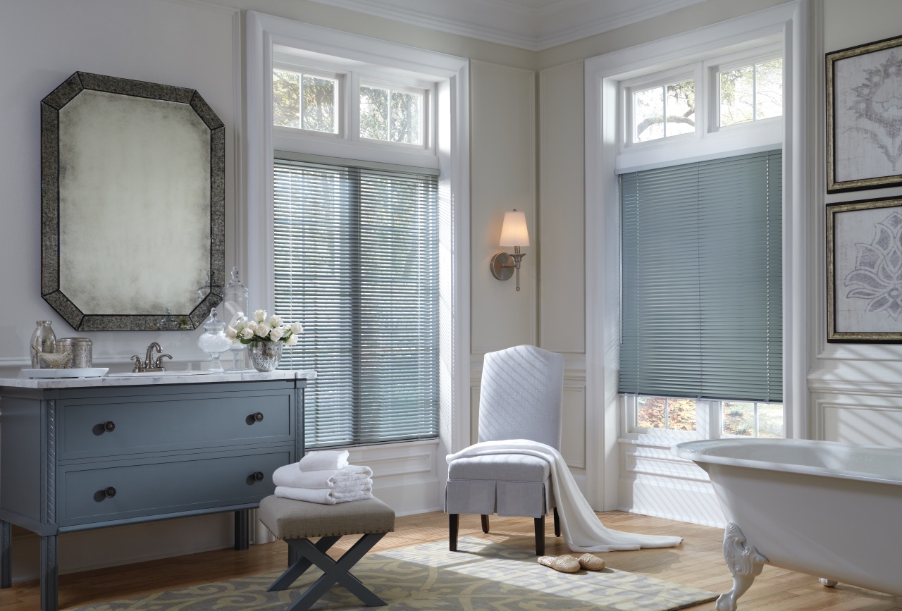 Modern Precious Metals® Aluminum Blinds in a bright bathroom with cool gray metal slats and filtered daylight