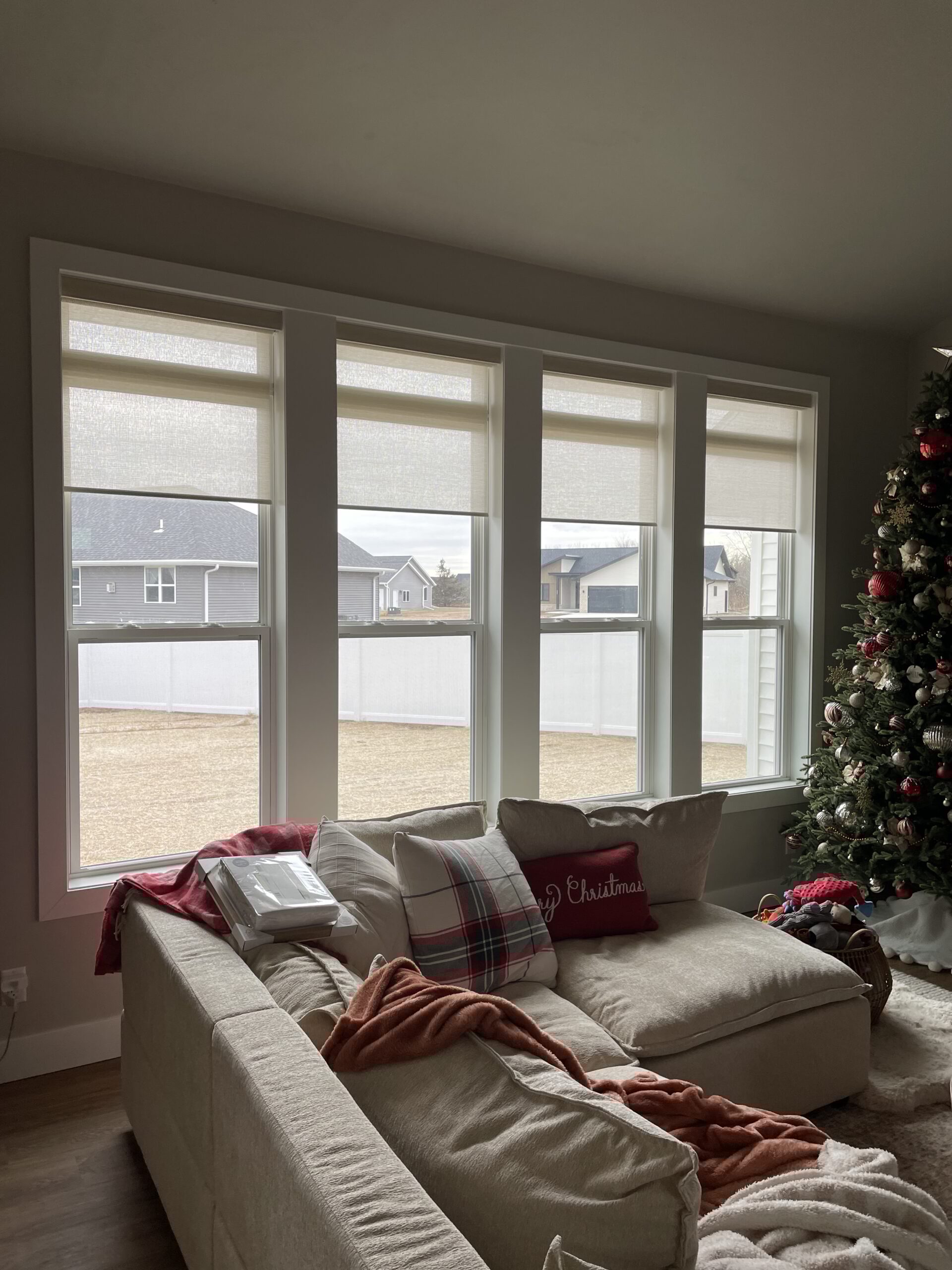Custom blind or shade installation photographed from inside the room