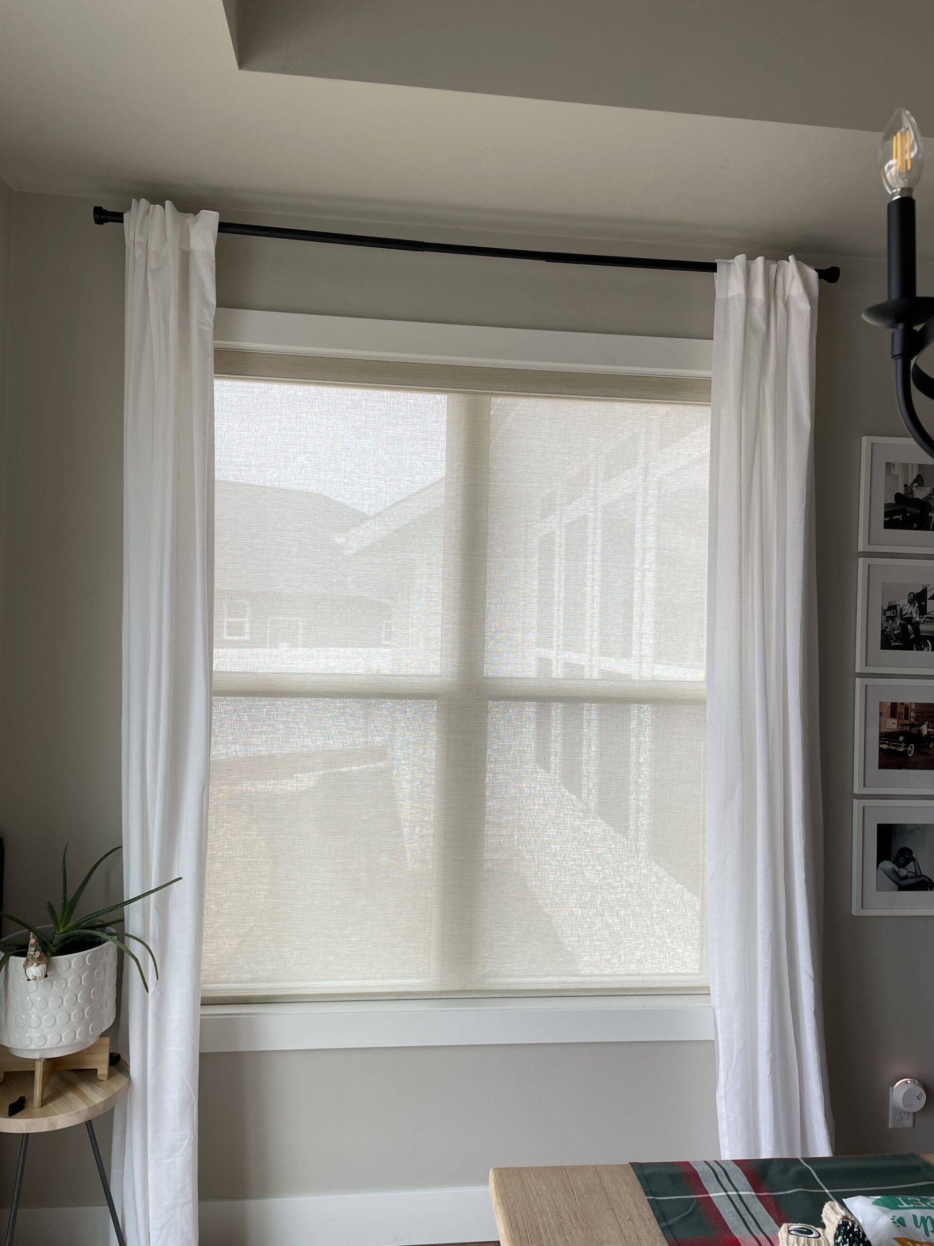 Installed window treatment in a furnished room