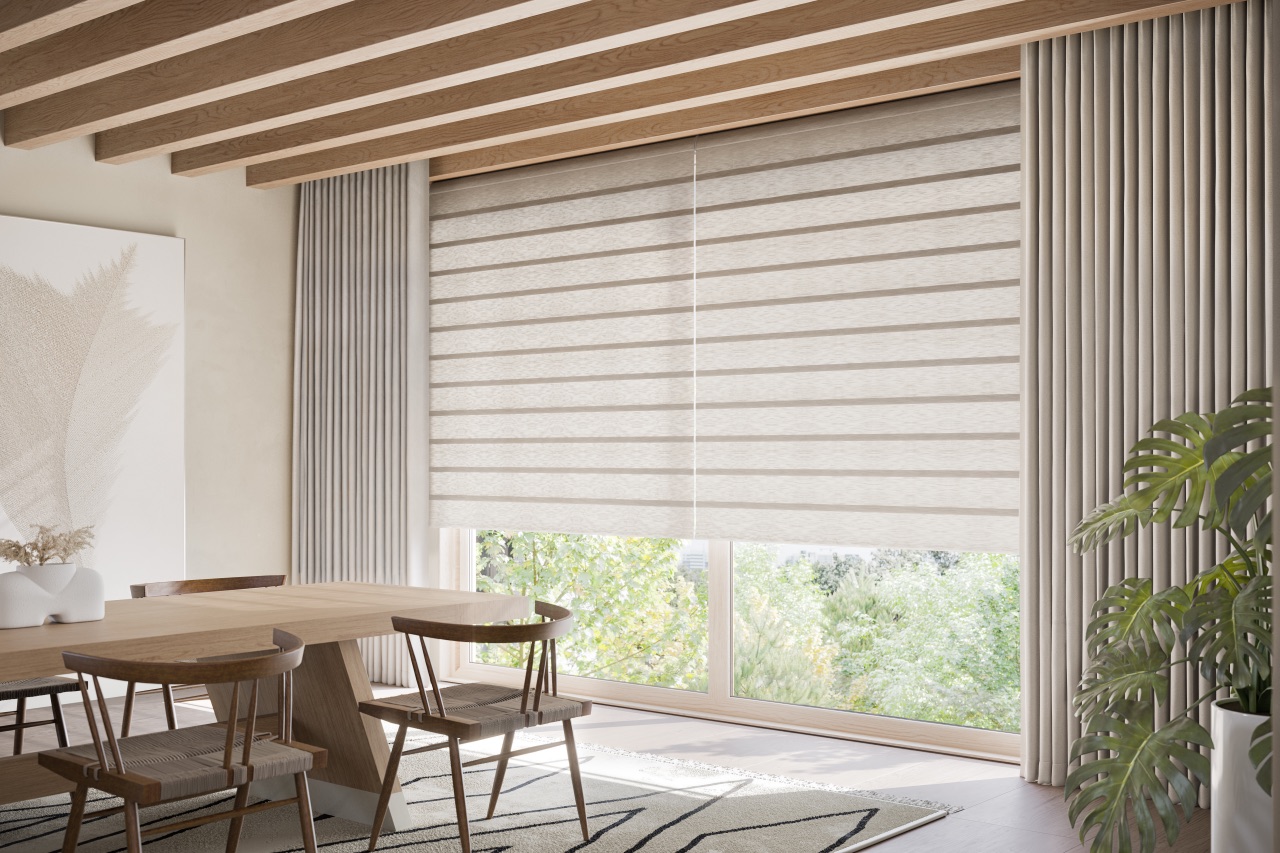 Vignette® Modern Roman Shades in a bright dining area with soft horizontal fabric folds and pale drapery panels